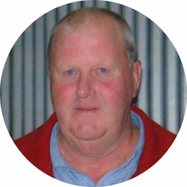 Older Man In Red Jacket Portrait